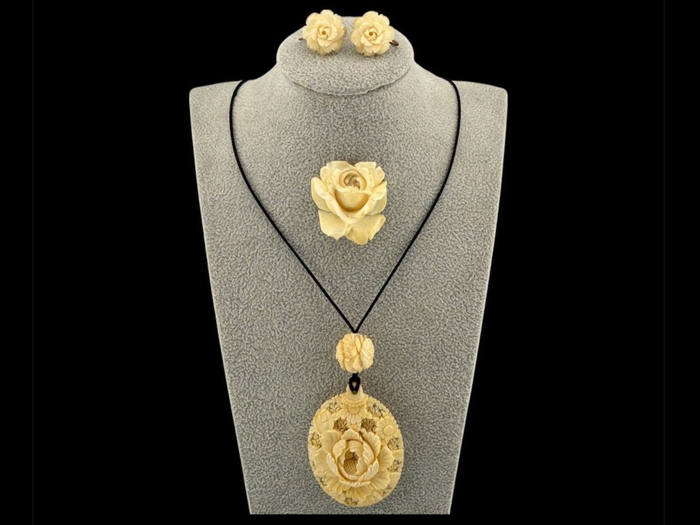 Bone pendants, clip earrings