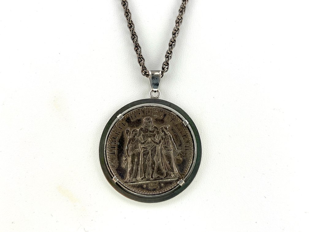 Sterling chain with 10 franc 900 silver coin; BX