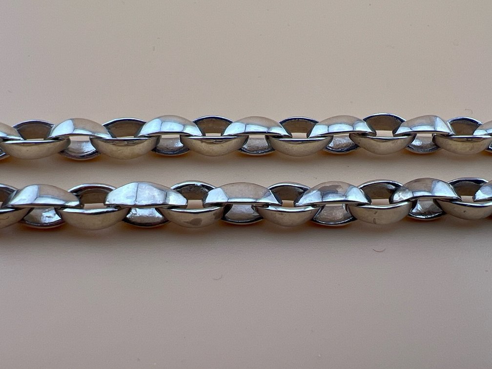 Pair of sterling silver link bracelets; BX