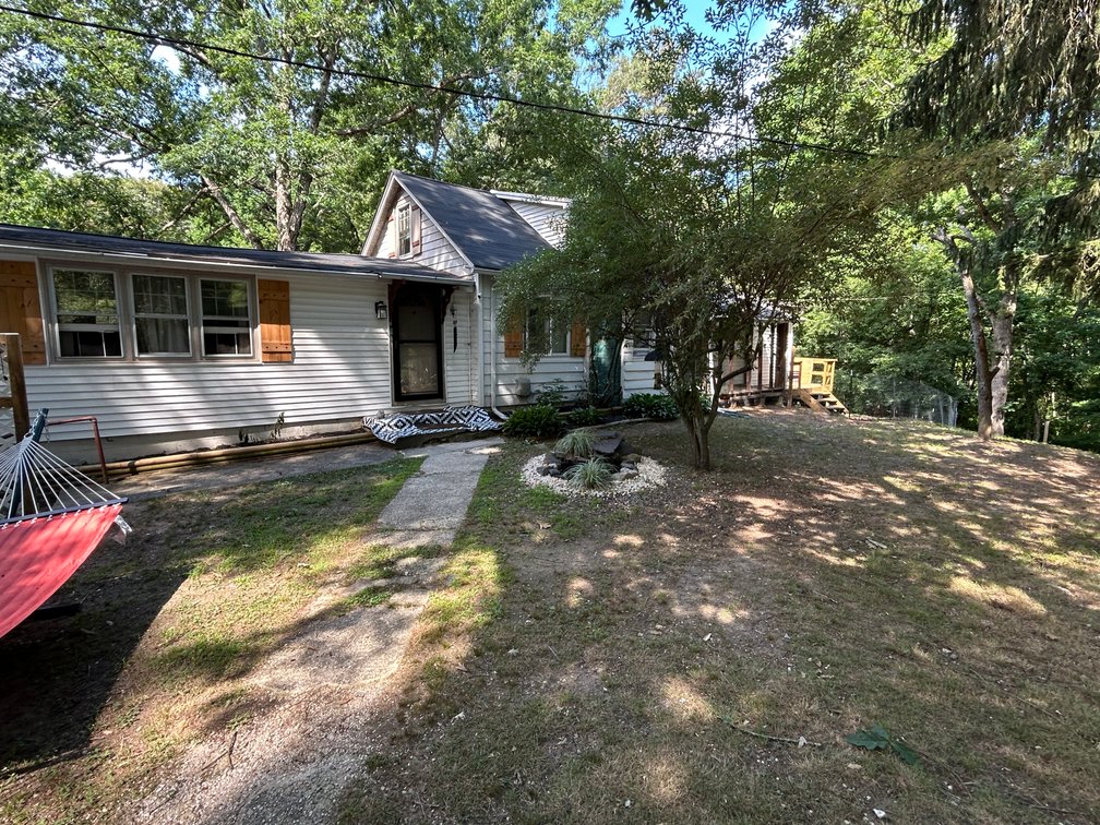 Image for 1,292 +/- sf Home on 6 +/- Acres of Wooded Undisturbed Land Available in Stow Creek Township