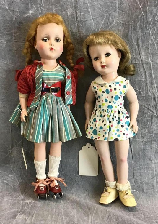 PAIR OF 14" HP DOLLS.