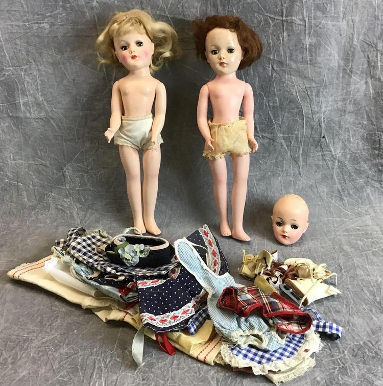 PAIR OF 14" HP DOLLS.
