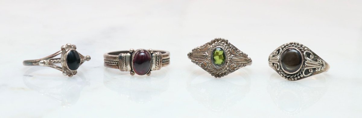 Lot of Four Sterling Rings with Gemstone