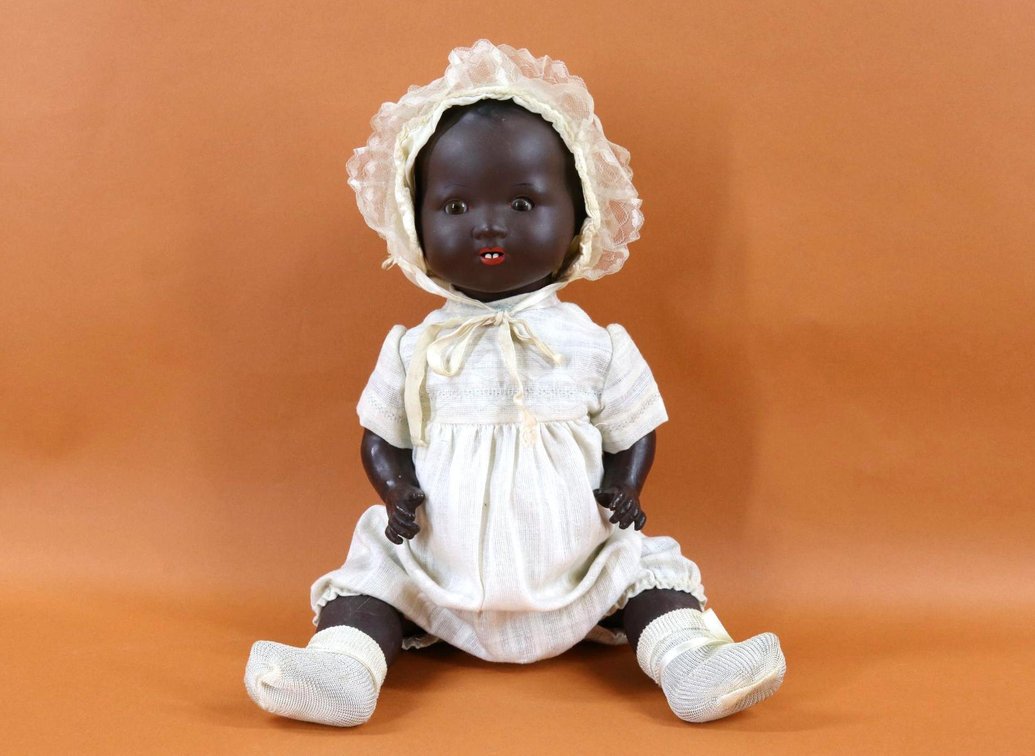 LOT OF BLACK DOLLS.