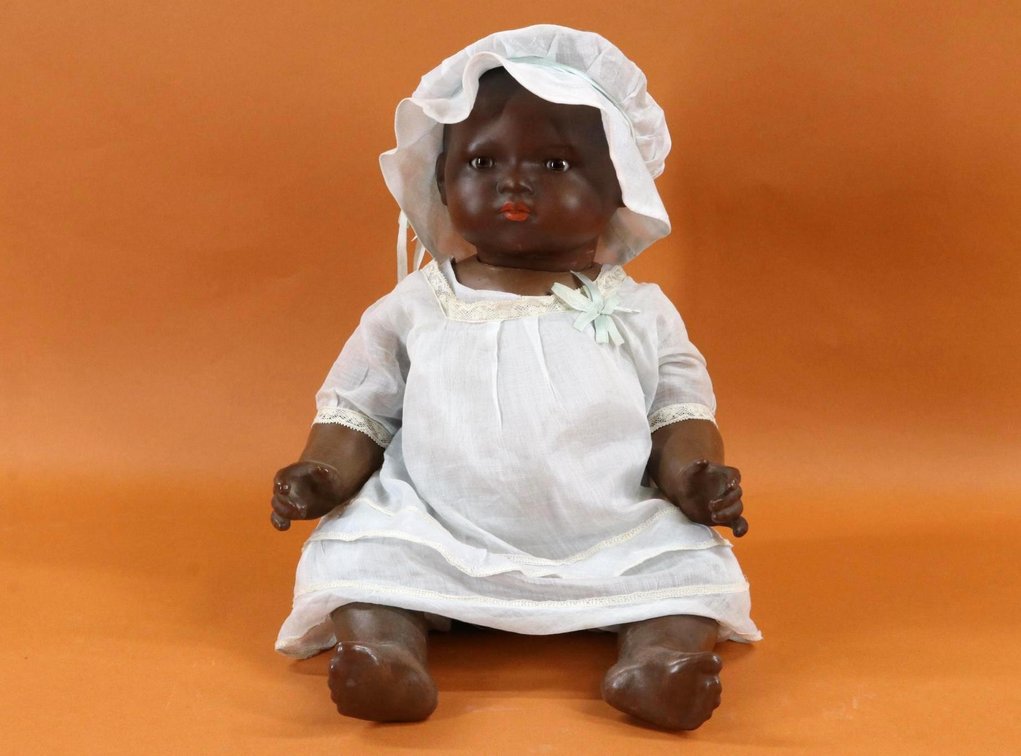 LOT OF BLACK DOLLS.