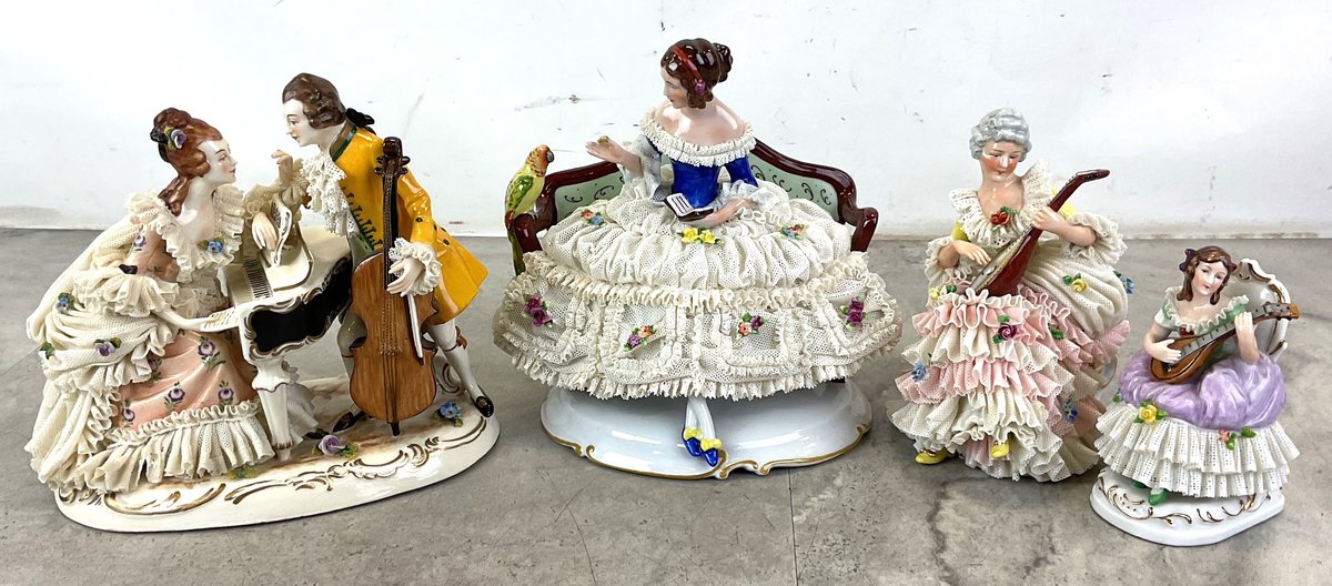 Porcelain Figurines with Lace Detailing