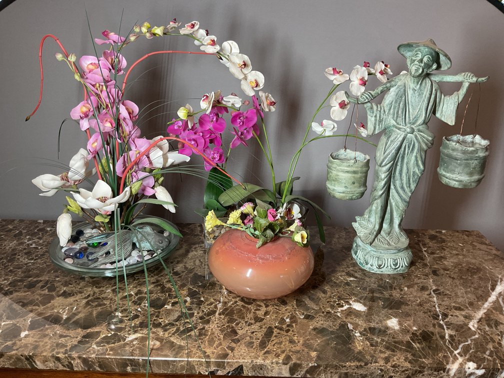 Faux Floral Arrangements and Verdigris Figure