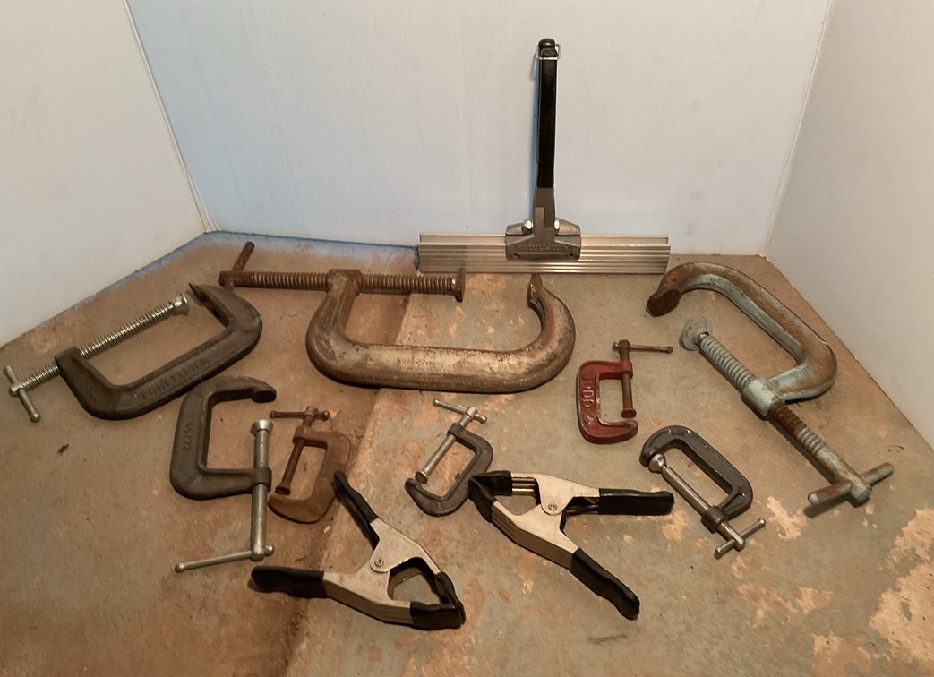 Assorted Craftsman, Judd, and Amerimax Clamps