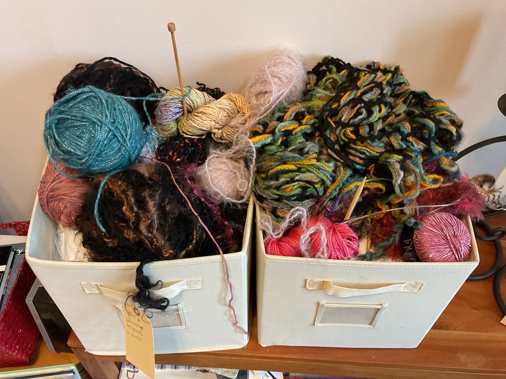Yarn and Unfinished Projects in Storage Bins
