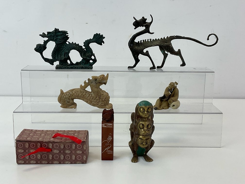 Cast Metal Dragons, Carved Stone Seal, and Figurines