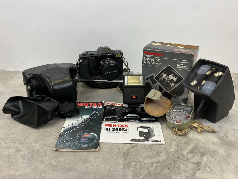 35mm SLR Camera with Lens, Light Meter, and Slide Viewer
