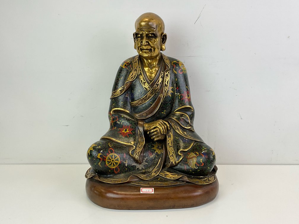 Seated Monk Statue