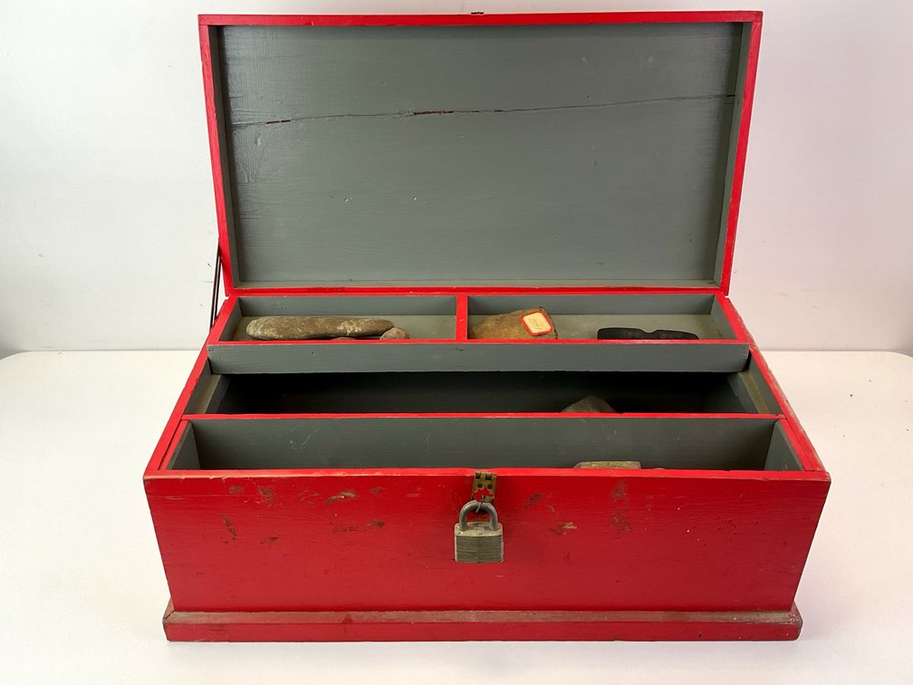 Red Painted Wooden Chest with Stone Tools