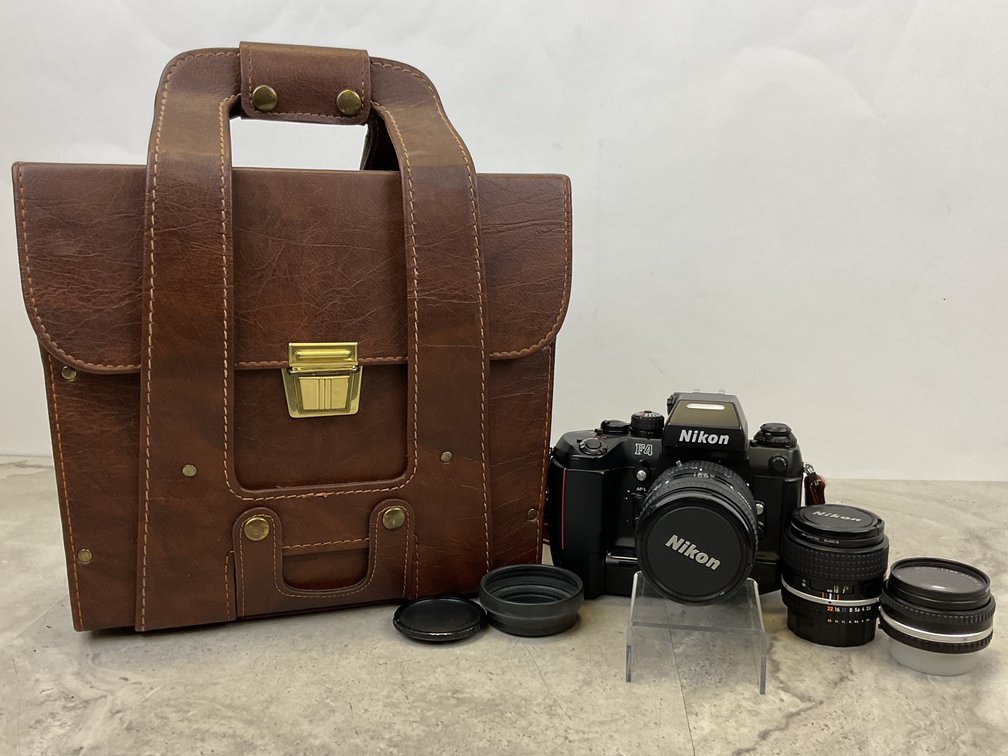 Nikon F4 35mm SLR Camera, Three Lenses, and Carrying Case
