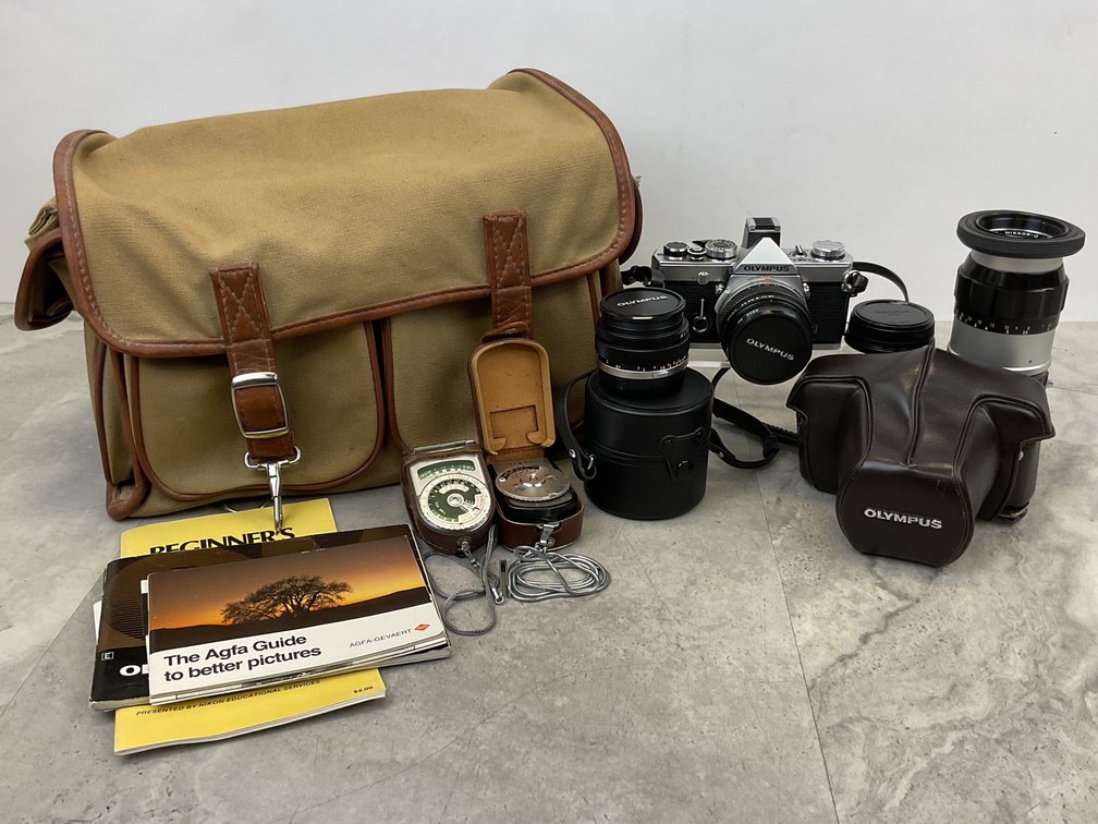 35mm SLR Camera, Lenses, Light Meters, and Accessories