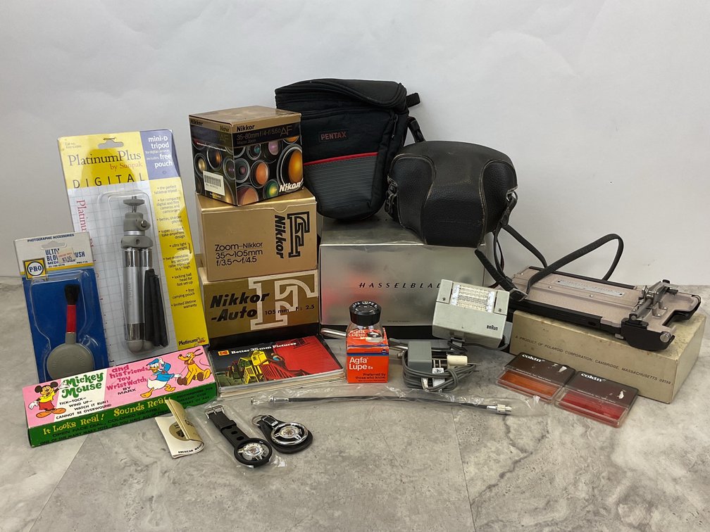 Camera Accessories, Equipment Boxes, and Novelty Watches