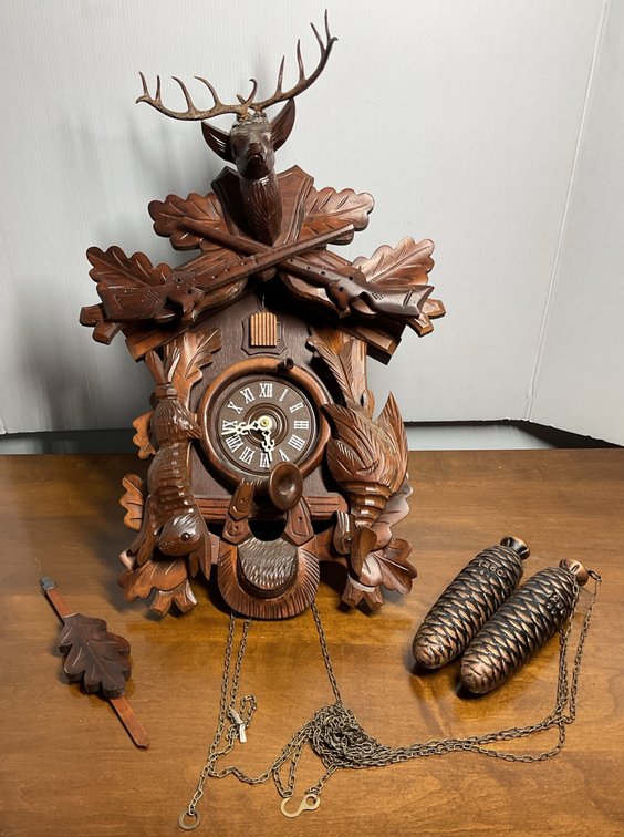 Carved Wood Hunter Style Cuckoo Clock