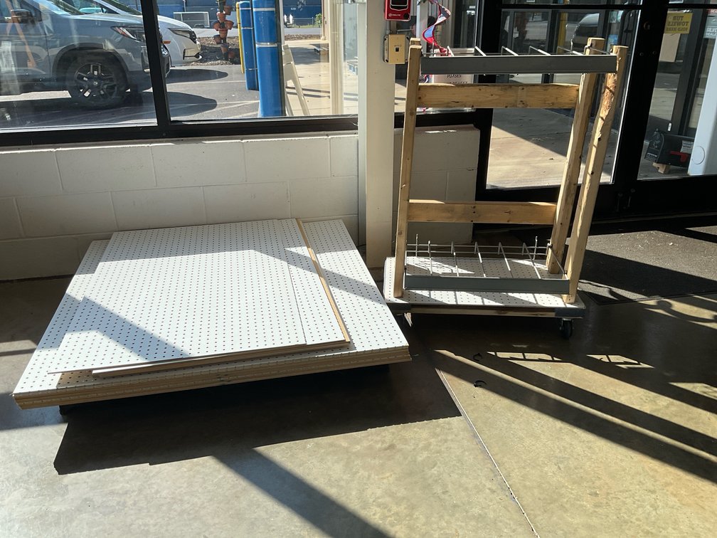 Rolling Display Rack with Stack of Pegboards