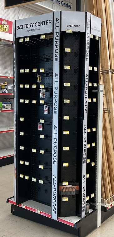 Retail Pegboard Battery Display Tower with Packaged Batteries