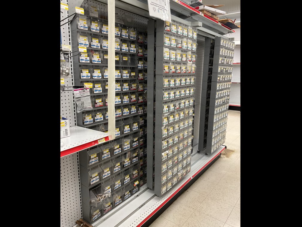 Sliding Display Rack with Tilt-Out Bins and Plumbing Fittings