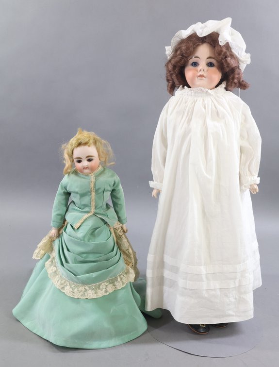 GERMAN BISQUE CLOSED MOUTH DOLLS.