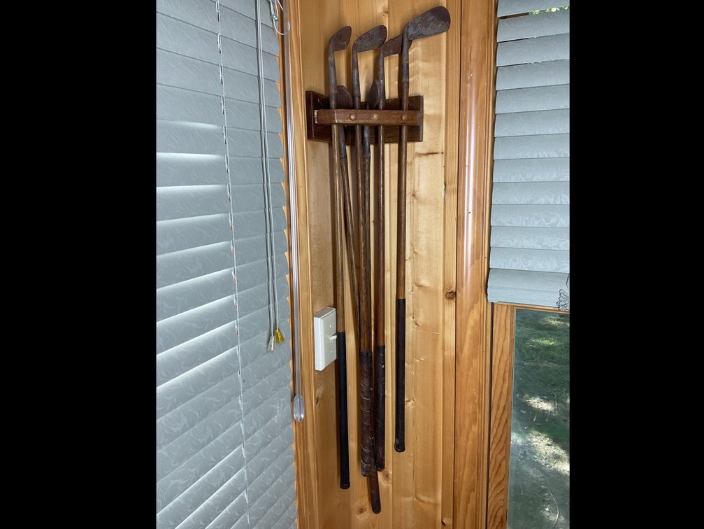 Golf Putters with Wooden Display Rack