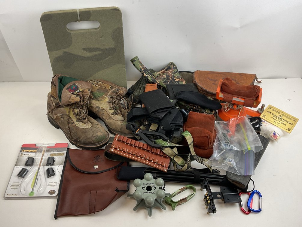 Hunting and Shooting Gear Lot with Boots, Rest, and Holsters