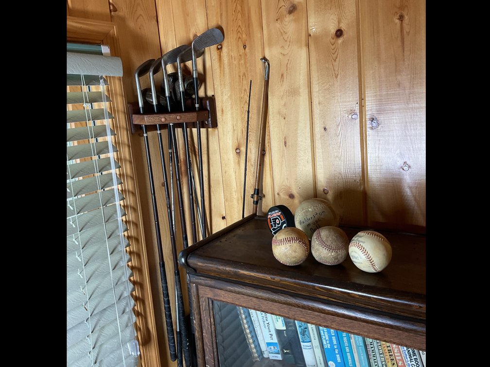 Sporting Goods Including Tennis Racquets, Baseball Bats, and Golf Clubs