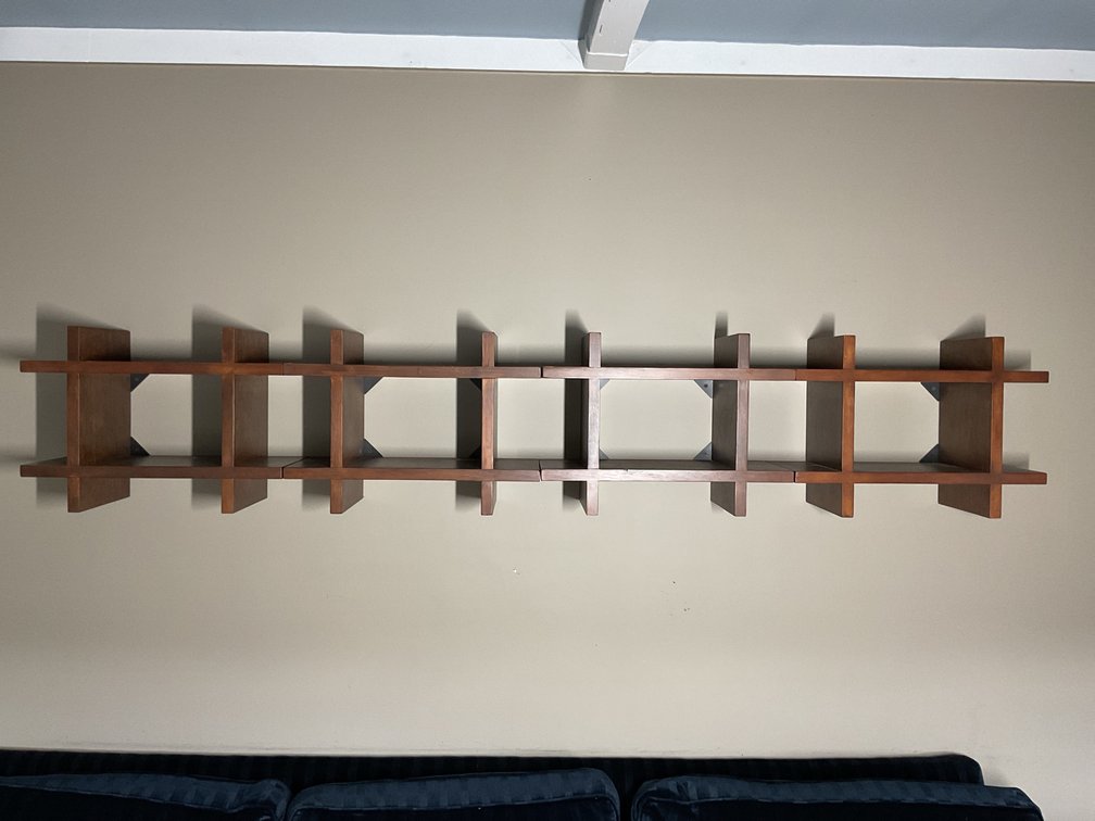 Wall-Mounted Wooden Shelving Unit with Open Design