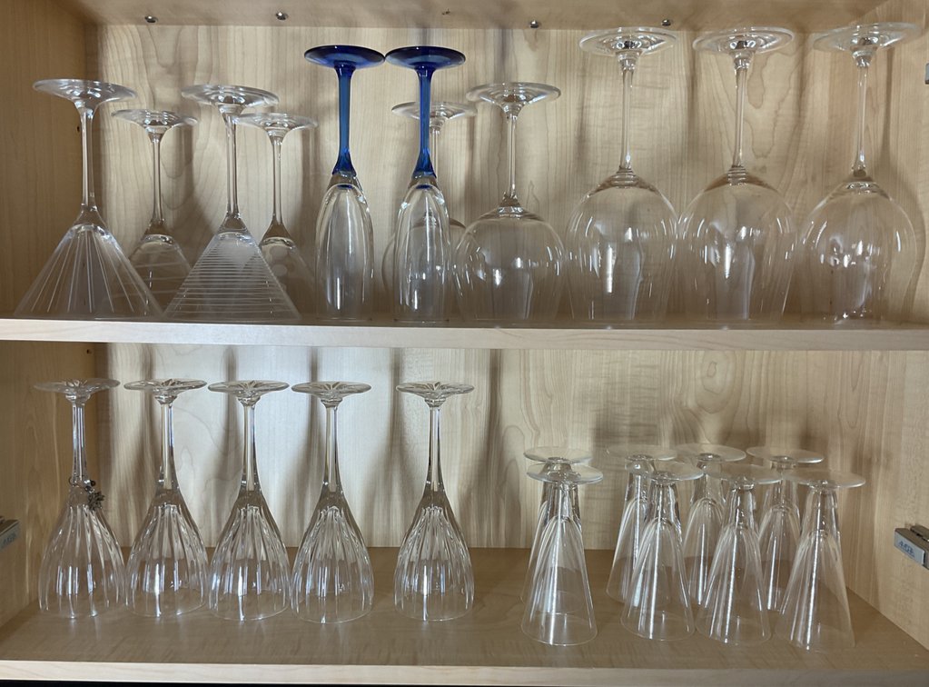 Assorted Glass Stemware Including Wine, Martini, and Pilsner Glasses