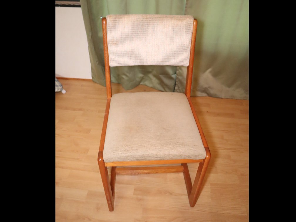 Mid-century chair with wooden frame and spindle back wood chair