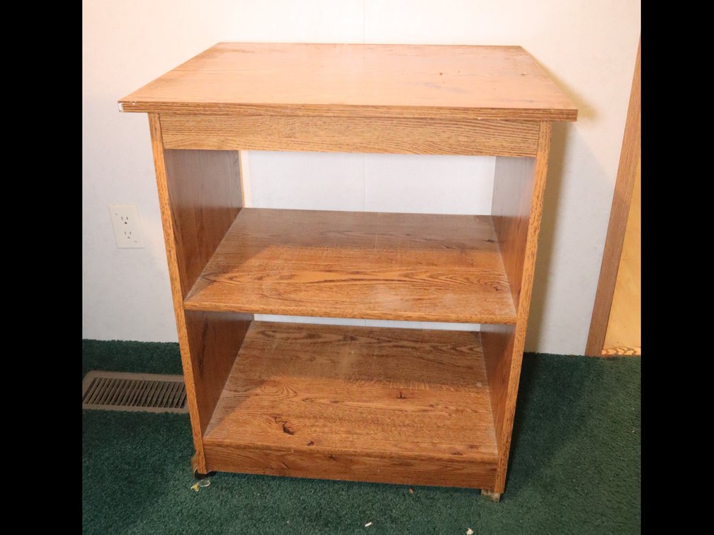 Two-shelf microwave stand and wooden folding TV tray table.