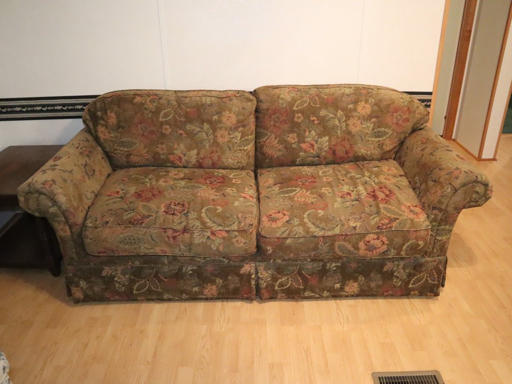 Two-cushion loveseat with floral tapestry upholstery