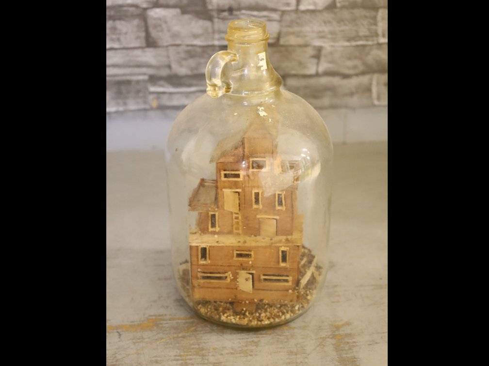 Folk Art House in a Glass Gallon Bottle