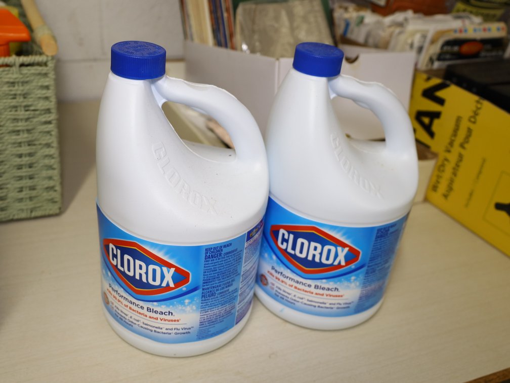 (2) Baskets of Cleaning Supplies: Clorox Bleach, Lysol Disinfectant Spray...