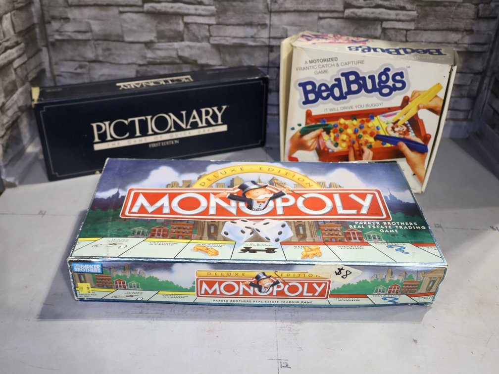 Family Games: Pictionary First Edition, Bed Bugs, Monopoly Deluxe Edition, Trivial Pursuit The 1980's Master Game, Buzz Word, & More!