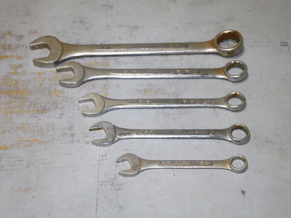 Assortment of Box-end, Combination , and Open-end  wrenches sized 5/8" - 3/4"
