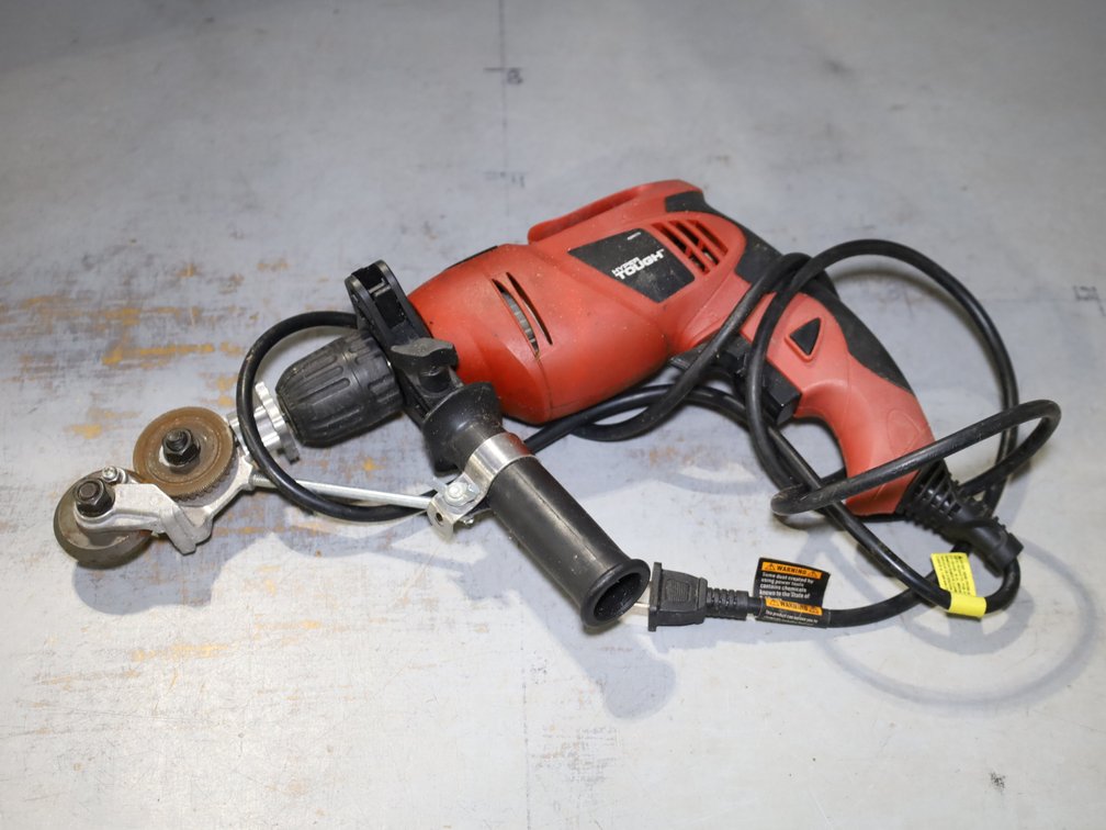 Hyper Tough 5-Amp 3/8" Electric Drill & Attached Sheet Metal Cutter Wheel