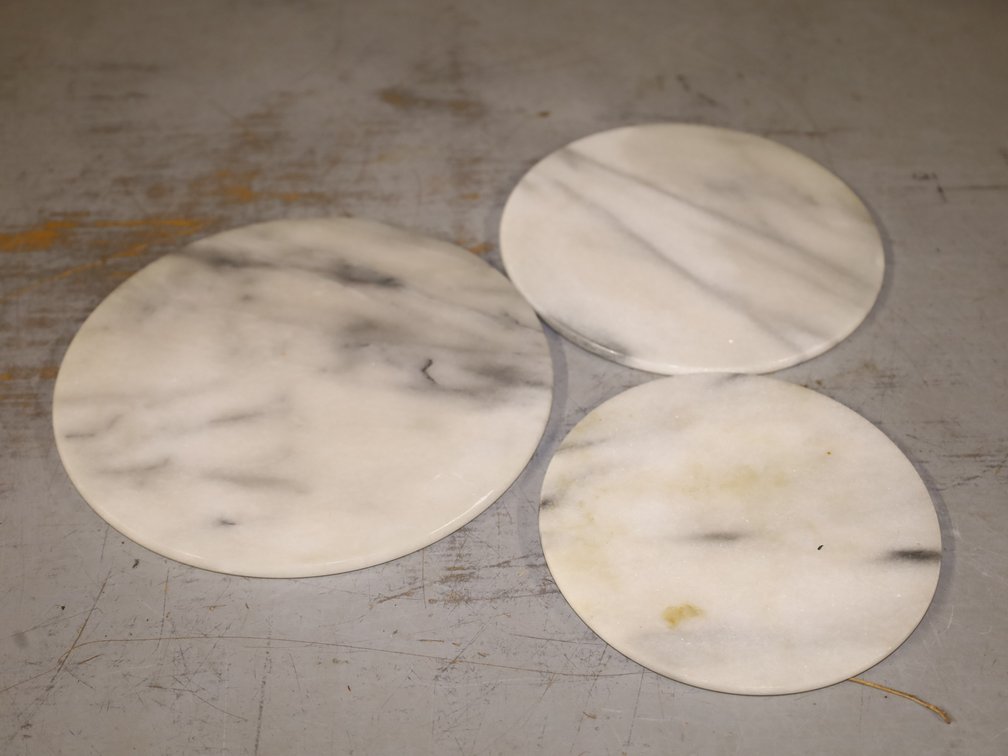 (3) Round Marble Boards, (2) Engraved Oval Trays...