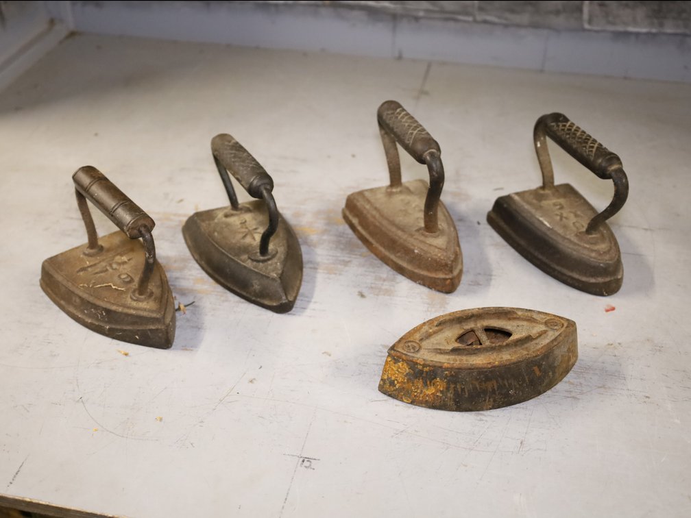 (4) Sad Irons & Handleless Iron w/ Vent Opening