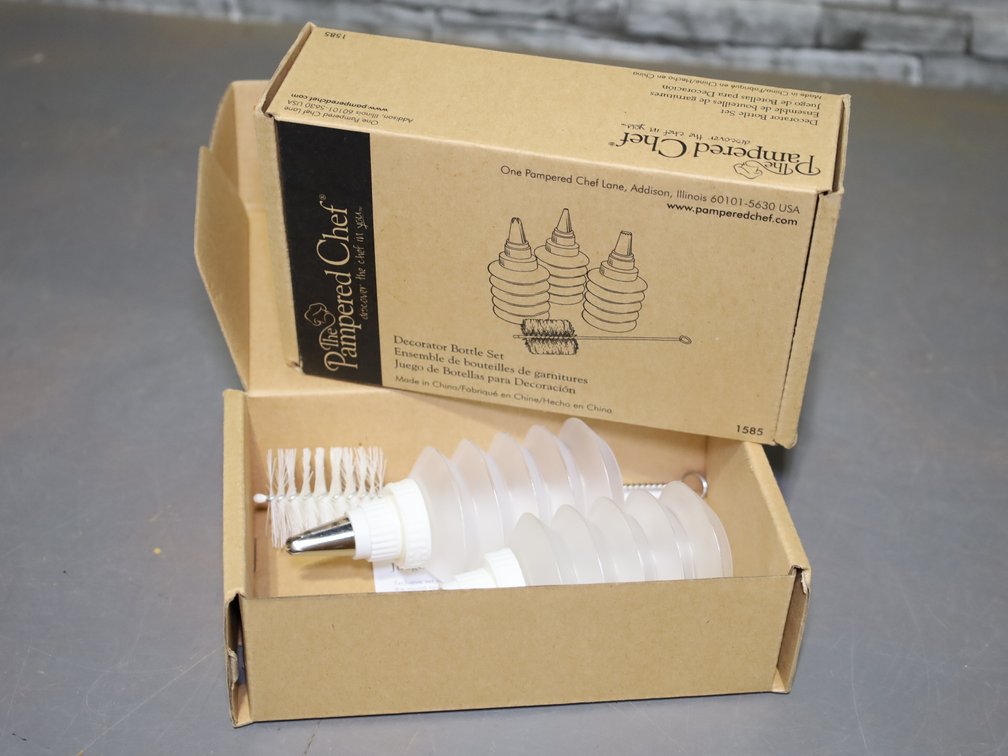 Pampered  Chef decorator bottle set, silicone molds, cookie cutters, aluminum cake decorator, etc.