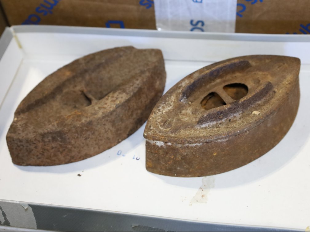 4  antique sad irons - 2 without handles 