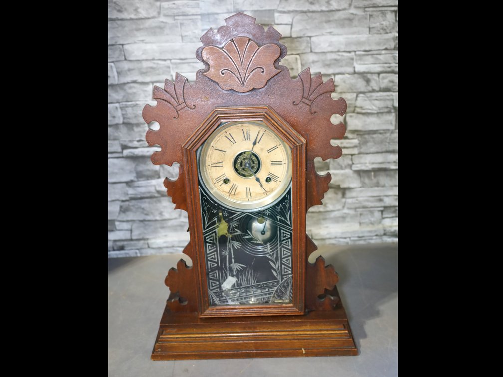 Vintage wooden mantel clock with pendulum