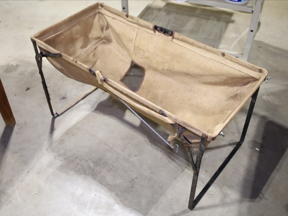 Fold-up vintage child's bouncy seat