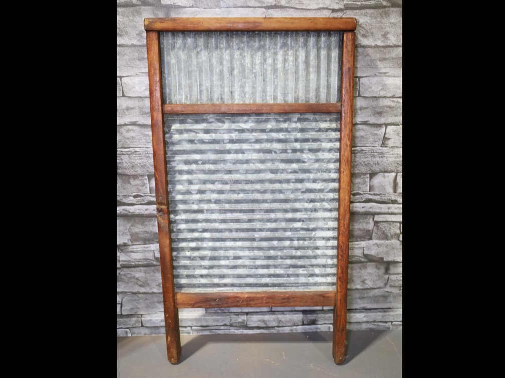 Wooden washboard with galvanized inserts