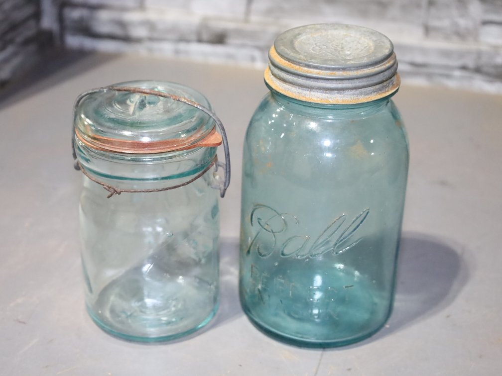 Brown Clorox gallon jug, White House Vinegar clear jug and more