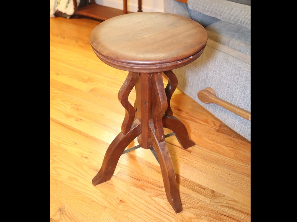 Swivel wooden piano stool