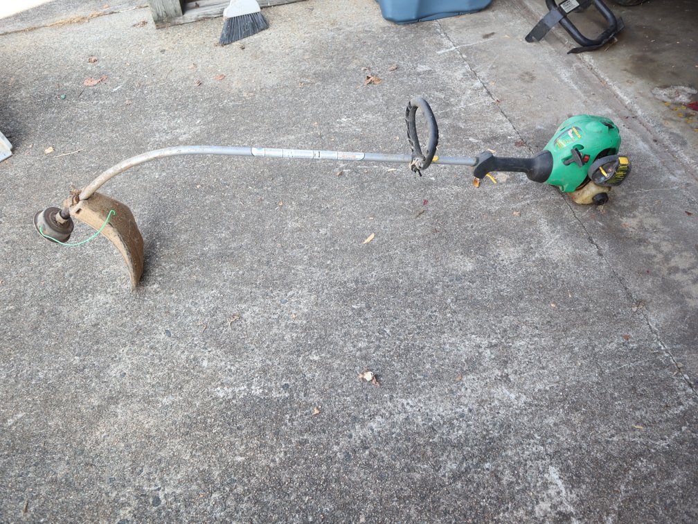 Feather-lite gasoline-powered weedeater