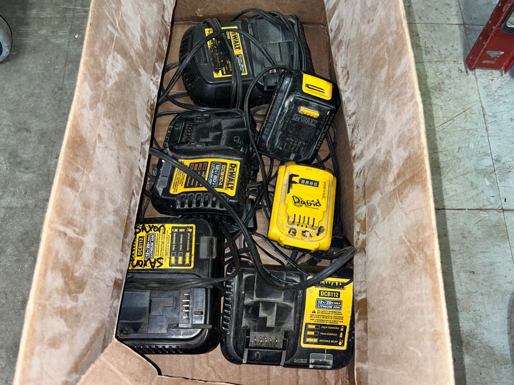 A Group of DeWalt Batteries and Chargers