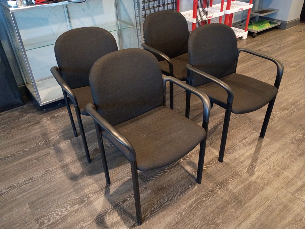 {each} Cloth Upholstered Stackable Arm Chair